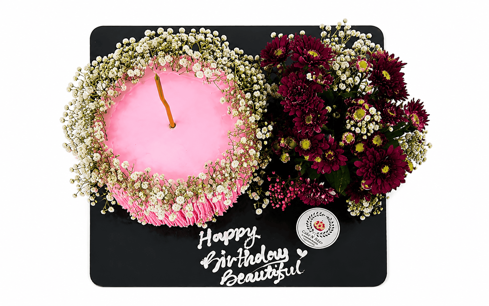 Pink floral birthday cake with fresh flowers in Ayodhya